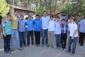 Randy Burke (Sixth from Left) with his cabin this summer.