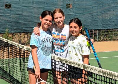 girls on tennis court